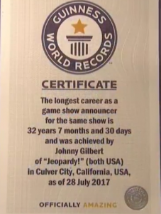 Johnny Gilbert, on the September 28, 2017 episode of Jeopardy!, received the Guinness World Record for "longest career as a game show announcer for one show": 32 years, 7 months, 30 days (as of July 28, 2017)